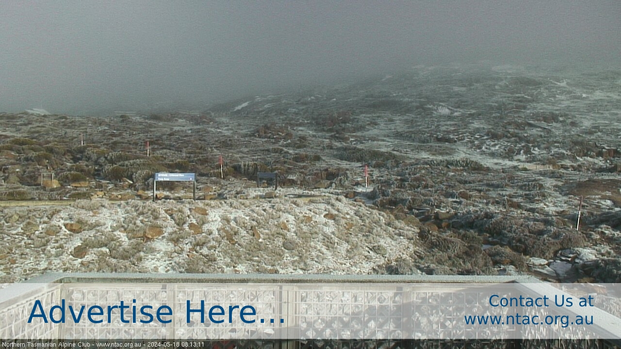 Snow Cam image looking from NTAC Lodge over the Ben Lomond ski field top slopes.